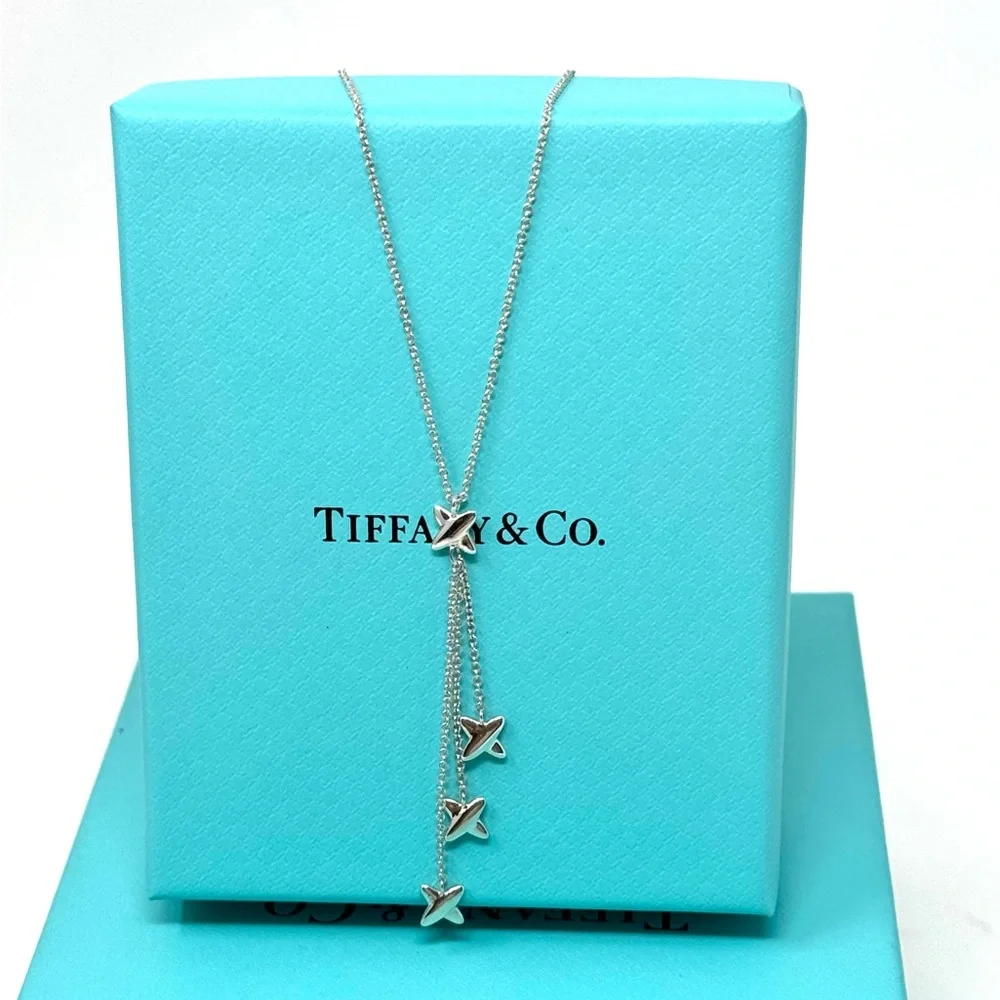Authentic Tiffany & co. Triple X Kiss Cross Drope Necklace.